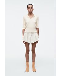 COS - Gerippte Sock Boots - Lyst