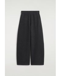 COS - Boiled Wool-Blend Barrel-Leg Pants - Lyst
