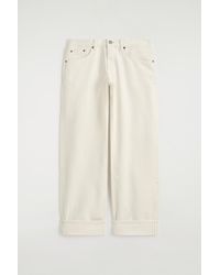 COS - Folde Curved-Leg Turn-Up Jeans - Lyst