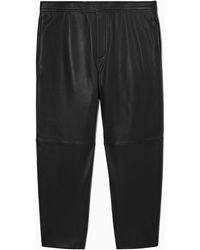 COS - Relaxed-fit Tapered Leather Pants - Lyst