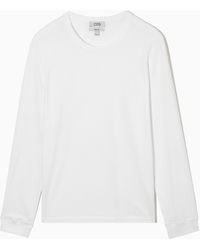 REGULAR-FIT MERINO LONG-SLEEVE T-SHIRT COS Uomo Abbigliamento Top e t-shirt Top 