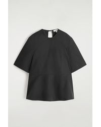 COS - Cotton Peplum Top - Lyst