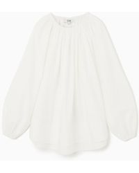 COS - Schulterfreie Oversized-bluse - Lyst