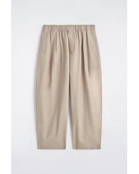 COS - Cotton Cropped Relaxed-Fit Barrel-Leg Trousers - Lyst