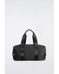 COS - Leather-Detail Duffle Bag - Lyst