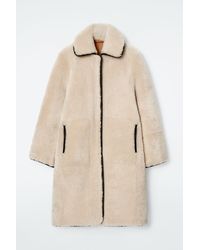 COS - Leather-trimmed Shearling Coat - Lyst