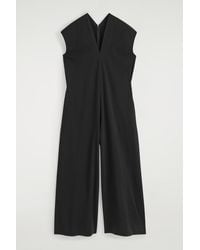 COS - V-neck Jersey Jumpsuit - Lyst