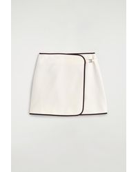 COS - Contrast-Trimmed Mini Wrap Skirt - Lyst