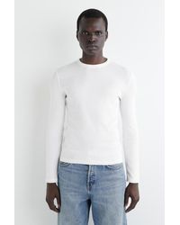 COS - Schmales, Geripptes Langarmshirt Aus Baumwolle - Lyst