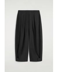 COS - Pleated Tapered Utility Pants - Lyst
