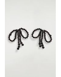 COS - Garnet Bow Earrings - Lyst