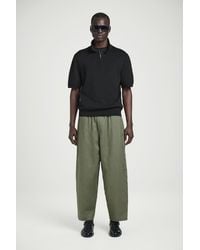 COS - Leinenhose Mit Weitem Bein Und Elastischem Bund - Lyst
