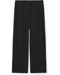 COS - Pleated Elasticated Pants - Lyst