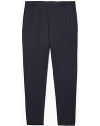 COS - Tapered Elasticated Wool-twill Pants - Lyst