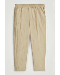 COS - Elasticated Cotton Regular-Fit Tapered Trousers - Lyst