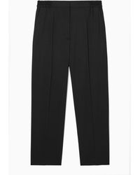 COS - Tapered Elasticated Wool Trousers - Lyst