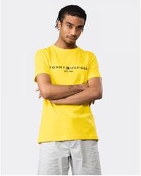 Tommy Hilfiger Clothing for Men | Online Sale up to 74% off | Lyst