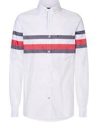 white and blue tommy hilfiger shirt