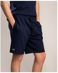navy blue lacoste shorts
