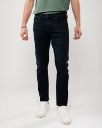 BOSS - Delaware Slim-fit Jeans In Dark Blue Soft-motion Denim - Lyst