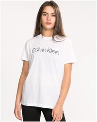 Calvin Klein T-shirts for Women - Up to 58% off at Lyst.com