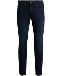BOSS - Delaware Slim-fit Jeans In Dark Blue Soft-motion Denim - Lyst