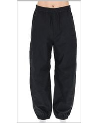Givenchy - Cotton-Polyester Trousers - Lyst
