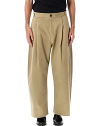 Studio Nicholson - Pleated Wide-Leg Cotton Trousers - Lyst