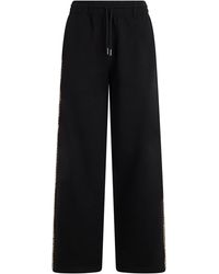 Burberry - Trousers With Check Finish - Lyst