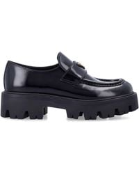 Prada - Brushed Leather Loafers With Enameled Triangle Logo And 50 Mm Monoblock Rubber Sole - Lyst