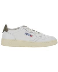 Autry - Medalist Low Leather Sneaker With Contrast Pull-Tab, Perforated Toe & Rubber Sole - Lyst