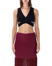 Alaïa - Ribbed Wrap-Effect Sleeveless Top With V-Neck And Side Cut-Outs - Lyst