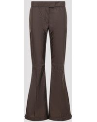 Miu Miu - Flared Technical Nylon Pants With Buttoned Hems - Lyst