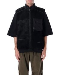 and wander - Mix Boa Patchwork Vest - Lyst