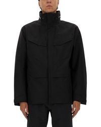 Veilance - Jacket With Foldable Hood - Lyst