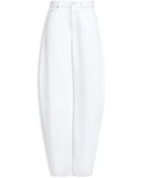 Alaïa - Round Leg High-Waist Cotton Denim Jeans With Five-Pocket Button Closure - Lyst