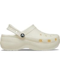 Crocs™ - | damen | classic platform glitter | clogs | weiß | 34 - Lyst