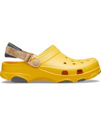 all terrain crocs tan