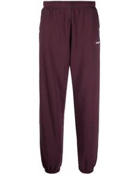 Red Track pants and sweatpants for Women | Lyst