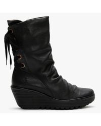 fly calf length boots