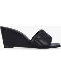 COACH - Emma Quilted Black Leather Wedge Mules - Lyst
