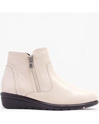 Caprice - Beige Patent Leather Low Wedge Ankle Boots - Lyst
