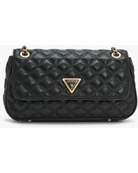 Guess - Giully Black Quilted Cross-body Bag - Lyst