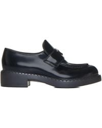 PRADA CALZATURE - Logo-Plaque Leather Loafers - Lyst