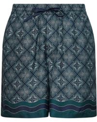 CASABLANCA - Printed Silk Radiating Monogram Shorts - Lyst