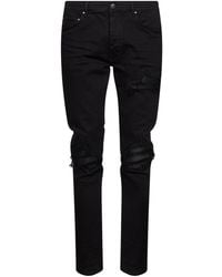 Amiri - Stretch Cotton Denim Mx1 Jeans With Patches - Lyst