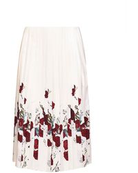 KHAITE - Cream Printed Twill Pleated Midi Skirt - Lyst