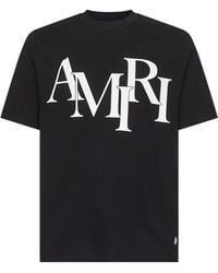 Amiri - T-Shirt Staggered Logo Nera - Lyst