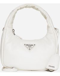 Prada - Logo Padded Mini Leather Hobo Bag - Lyst