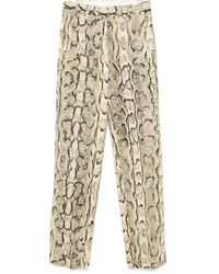 Dries Van Noten - Pantaloni con stampa serpente - Lyst